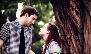 couple-romancing-under-tree