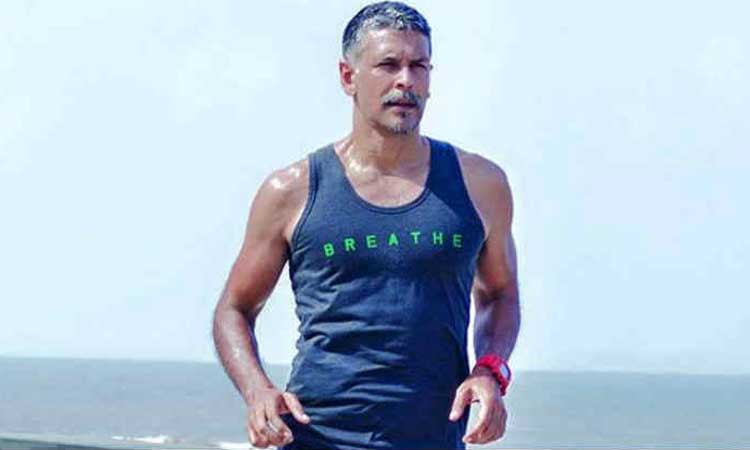 milind soman running slippers