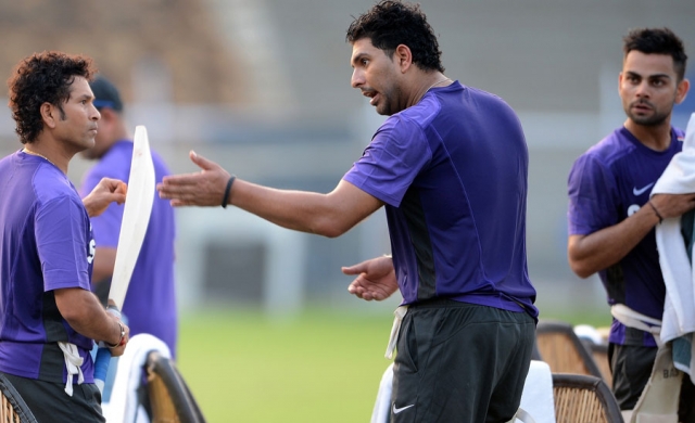 Sachin_Tendulkar_and_Yuvraj_Singh_have_a_chat_during_training_Mumbai_November_9_2012