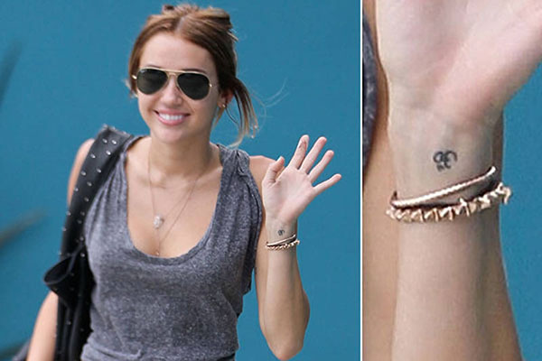 celebrity Om tattoo examples include Miley Cyrus, Lauren London, Selena  Gomez