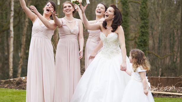 Bride-With-Bridesmaids-On-Wedding-Day1