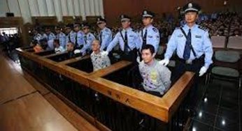 Son of Chinese tenor stands rape trial