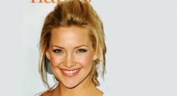 Hudson’s daring neckline draws eyeballs