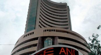 Sensex trades flat during pre-noon trade